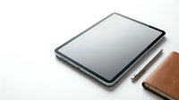 Modern tablet computer with stylus pen and leather wallet on clean white background for business and technology presentations.