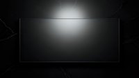 Black television screen with cracked glass effect background for modern technology and entertainment concepts in dark atmospheric setting.