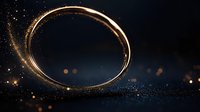 Glowing golden ring with magical sparkles and light trails on dark background with bokeh effect creates mystical atmosphere for luxury design projects.