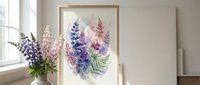Watercolor lupine flowers and fern leaves botanical illustration in wooden frame on white wall. Modern home decor artwork for living room interior design.