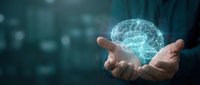 Businessman holding glowing digital brain hologram in cupped hands representing artificial intelligence, machine learning and innovative technology solutions.