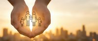 Protective hands forming heart shape around paper cut family silhouette against warm sunset city skyline. Family protection, insurance, care concept.