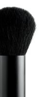 Close-up of a professional makeup brush with soft black bristles and sleek handle, isolated on white background for beauty and cosmetics design.