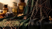 Halloween apothecary scene with vintage bottles, spider webs, black pumpkins and autumn leaves creating spooky atmospheric decoration for seasonal design.