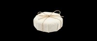 Round coaster set wrapped in cream fabric with twine bow, isolated on transparent background. Great for home decor clipart, stickers, print on demand, and T-shirt design use.