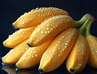 Fresh yellow bananas with water droplets on dark background, showcasing natural texture and vibrant color for food photography and healthy eating concepts.