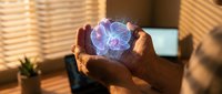 Hands cupping glowing holographic brain with neural networks in warm office setting. Concept for artificial intelligence, neuroscience, and mental health.