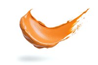 Orange cosmetic cream smear isolated on white background with soft shadow. Textured makeup product swatch showing creamy consistency and glossy finish.