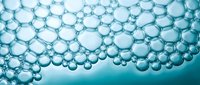 Abstract blue bubble foam texture with spherical cells creating organic pattern for backgrounds and scientific illustrations.