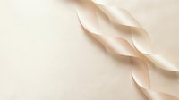 Cream silk ribbons on neutral background, isolated design element for invitations, packaging, and decorative projects.