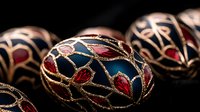 Ornate Easter eggs decorated with intricate gold filigree pattern on dark blue and red enamel background showcase luxurious holiday craftsmanship and design.