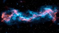 Vibrant cosmic nebula with swirling pink and blue gas clouds against starry black space background, celestial formation glowing with ethereal light in deep universe.