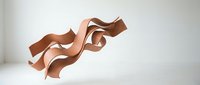 Elegant copper ribbon flowing gracefully through air against clean white background, perfect for luxury branding and sophisticated design projects.