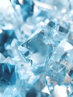 Crystal clear ice cubes with refreshing blue tones creating cool atmosphere for beverages, cocktails and summer drinks in macro photography.