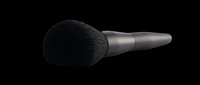 Soft black makeup brush with round fluffy head and gray handle, isolated on transparent background. Ready for beauty, cosmetics, and design projects including t-shirts, clipart, and print-on-demand products.