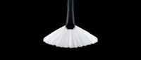 Fan-shaped makeup brush with black handle and white bristles, isolated on transparent background, ready for design use on t-shirts, clipart, and print-on-demand products.
