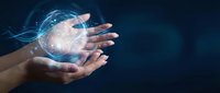 Hand holding glowing digital globe with network connections, representing global technology, data transfer, and worldwide business communication on dark background.