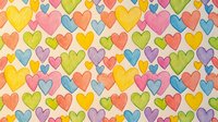 Colorful hearts seamless pattern with watercolor texture on beige background. Repeating romantic design tiles perfectly for wallpaper, fabric, wrapping paper.