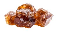 Brown crystalline sugar candy pieces with rough textured surface and translucent amber glow, showing natural raw sugar crystals on white background, isolated.