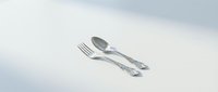 Silver fork and spoon cutlery set on white background isolated for kitchen dining restaurant culinary design projects and food service concepts.