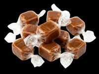 Wrapped caramel candies pile isolated on transparent background, ready for sticker, clipart, t-shirt design, print on demand, and sublimation use.