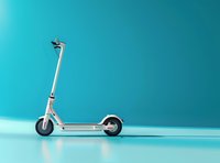 Modern electric scooter on turquoise background with shadow reflection. Minimal urban transportation concept for eco-friendly mobility solutions.