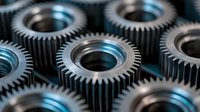 Close-up view of steel mechanical gears with precise teeth arrangement in industrial machinery, featuring metallic texture and dramatic lighting for engineering concepts.