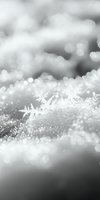 Macro shot of delicate ice crystals and snowflakes on frozen ground with bokeh background, suitable for winter, seasonal, and nature design projects.