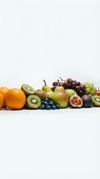 Fresh mixed fruits arrangement with oranges, kiwi, grapes, blueberries, figs and pears on white background for healthy eating and nutrition concepts.