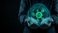 Business professional holding glowing digital sphere with interconnected gears representing innovation, technology integration and strategic planning.