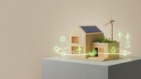 Wooden house model with solar panel and wind turbine surrounded by glowing green eco icons, symbolizing sustainable energy and smart living.