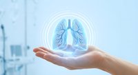 Healthcare professional holding holographic lung anatomy model in medical facility for respiratory health education and pulmonary disease awareness campaigns.