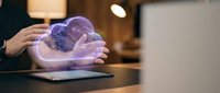Futuristic holographic brain projection emerging from tablet device in modern office environment showcasing advanced neuroscience technology and digital innovation.