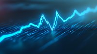 Glowing blue financial chart line showing market volatility against dark digital background with data visualization elements, suitable for business presentations.