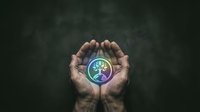 Hands holding glowing orb with tree symbol, representing environmental protection, sustainability, and eco-friendly business solutions for corporate and green energy concepts.