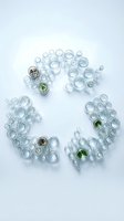 Overhead view of empty glass jars arranged in circular pattern with fresh herbs inside some containers on white background, suitable for food storage and kitchen organization concepts.