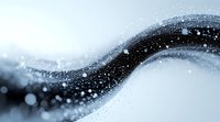 Abstract flowing wave design in black and white with sparkling bokeh effect and soft blurred particles creating dynamic motion against light background.
