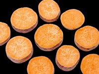 Sweet potato slices scattered on transparent background, cut out and ready for food design, stickers, print on demand, T-shirts, and sublimation projects.