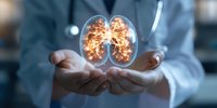 Medical professional holding glowing holographic lungs showing inflammation and disease visualization in cupped hands against dark hospital background.