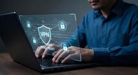 Man using laptop with VPN security interface overlay showing virtual private network protection and cybersecurity technology for safe internet browsing.