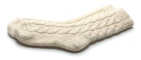 Cozy cream knitted wool sock with cable pattern isolated on white background, perfect for winter fashion, holiday, and handmade craft concepts.