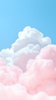 Dreamy pink and white cumulus clouds against light blue sky background, creating soft ethereal atmosphere for romantic and peaceful designs.
