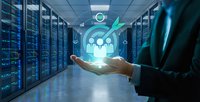 Business professional holding glowing digital network icons in modern server room with blue lighting for technology and data management concepts.