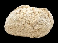Whole wheat bread loaf with visible air pockets, isolated on transparent background. Ready for design use on t-shirts, clipart, stickers, print-on-demand products, and sublimation projects.