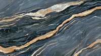 Luxurious dark marble texture with golden veins creating dramatic diagonal pattern. Natural stone surface with metallic streaks for luxury interior design background.