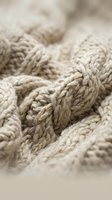 Natural jute rope coils with twisted fiber texture in warm beige tones, nautical marine cordage for crafting and industrial applications.
