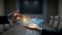 Businessman holding digital hologram of industrial factory with glowing lights and technology interface, representing smart manufacturing, industry innovation, and data analytics for business solutions.