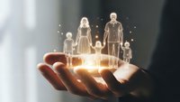 Hands holding glowing family figures representing life insurance protection and financial security for loved ones.