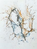 Dynamic liquid splash in blue and gold tones creates abstract heart shape against white background, mixing water and metallic paint for artistic effect.