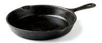Black cast iron skillet pan isolated on white background for cooking and kitchen design projects.